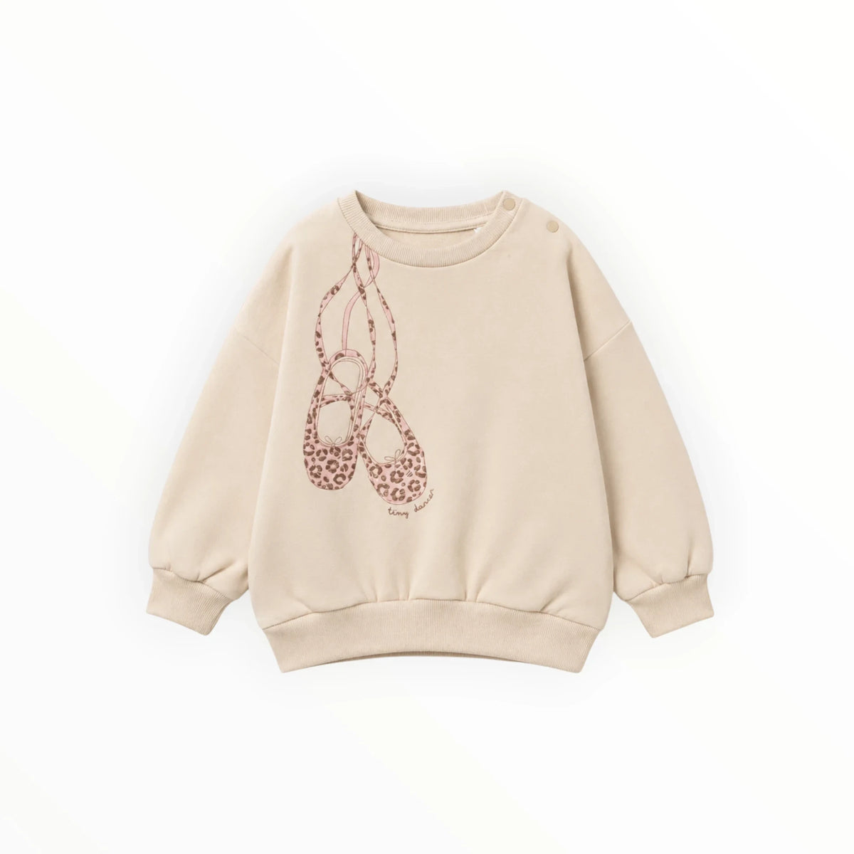Pierrot Outlet beige kindersweater met lange mouwen en een print van balletschoentjes met luipaardmotief.