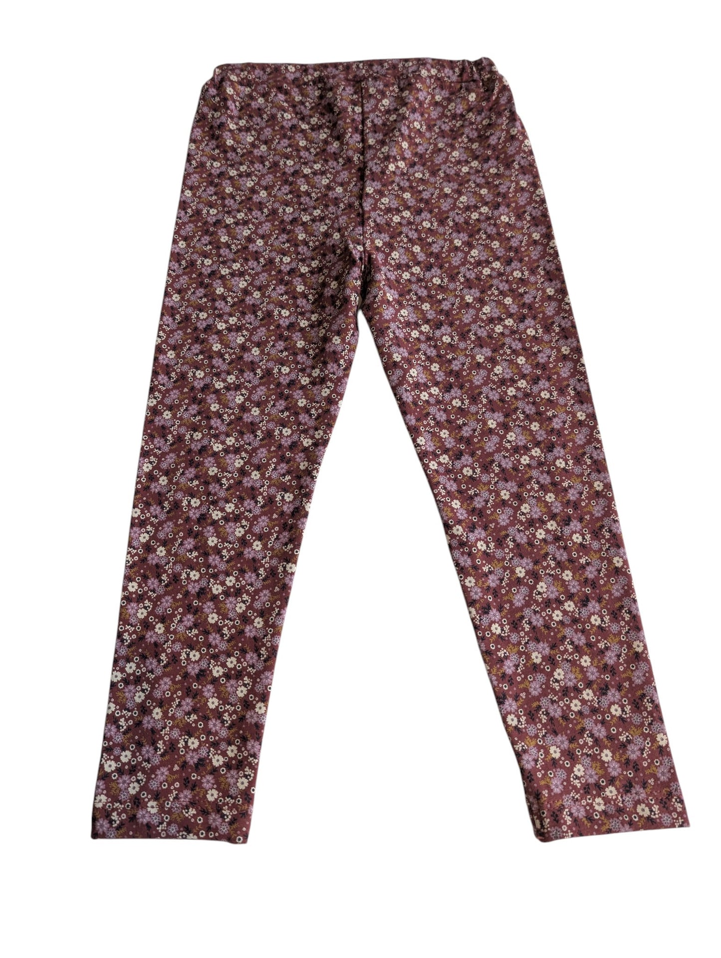 Pierrot Outlet dames legging met bloemenprint in aardetinten, paars en wit. Gemaakt van zachte, rekbare stof.
