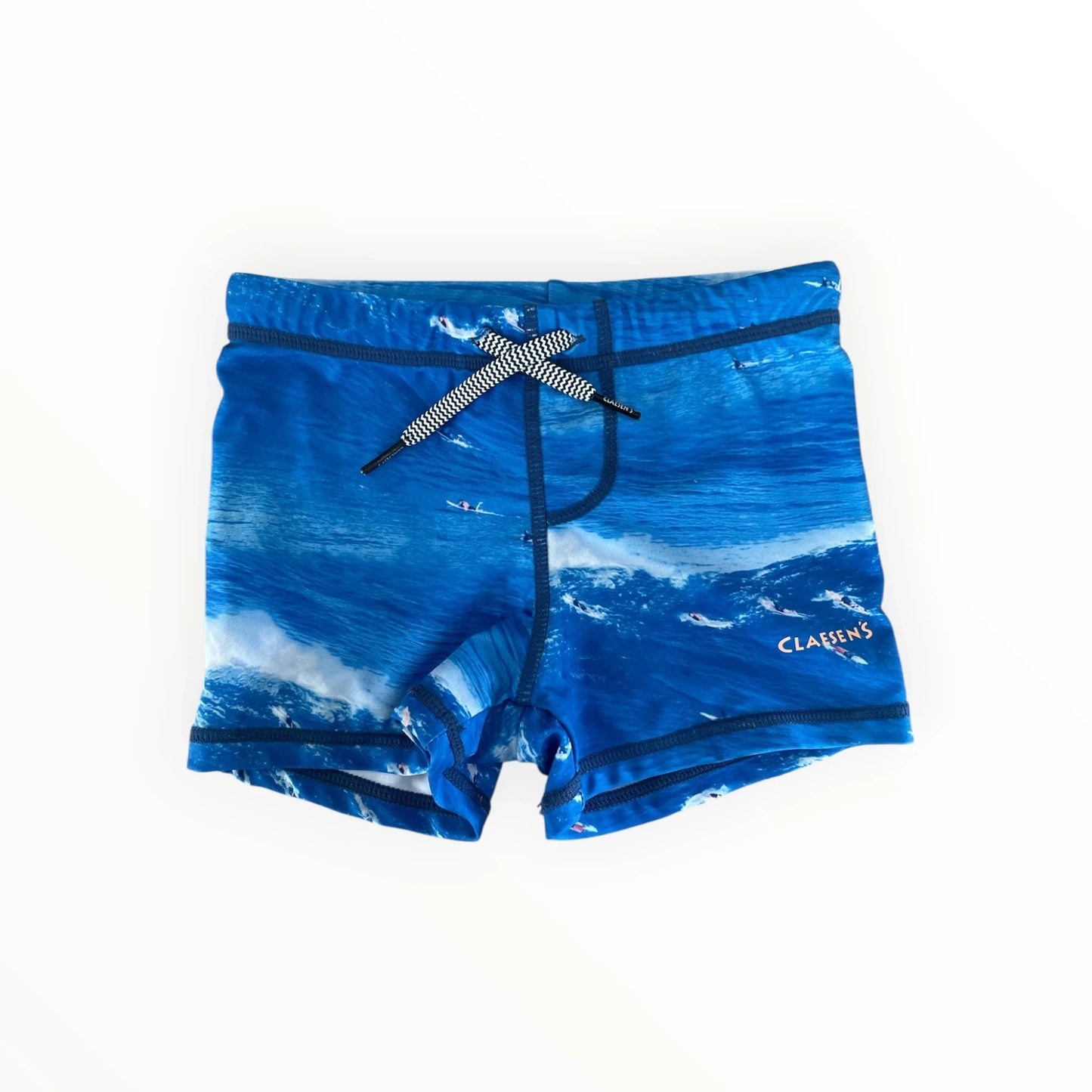 Blauwe Claesen's jongens zwembroek met surfprint, elastische tailleband en zwart-wit trekkoord van Pierrot Outlet.