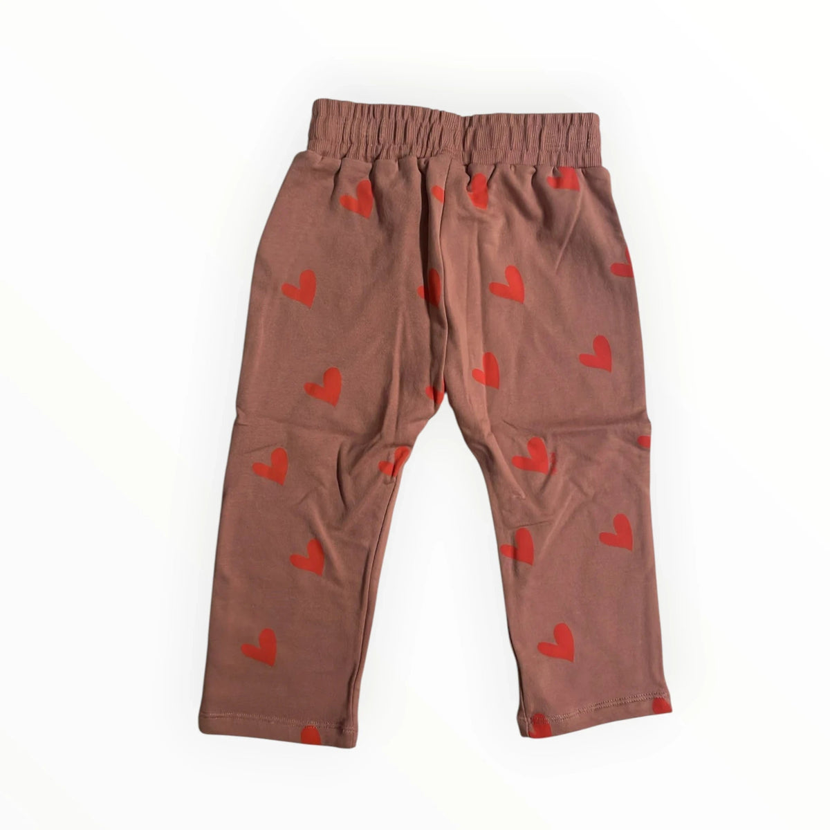 Pierrot Outlet kinderbroek in oudroze katoen met felrode hartjesprint en elastische tailleband