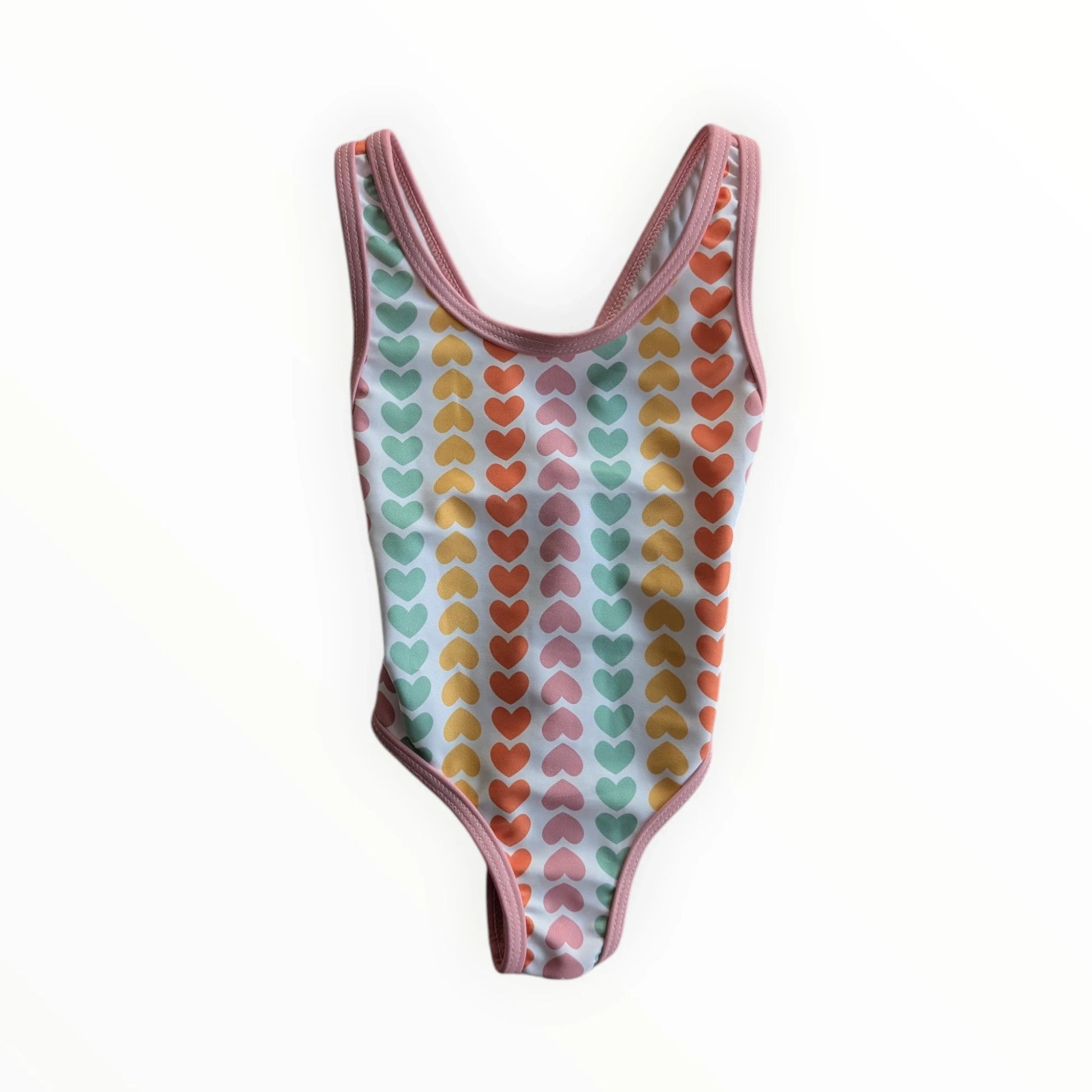 Pierrot Outlet baby meisjes badpak met hartjesprint in pastelkleuren en roze biesje. Gekruiste bandjes op de rug.