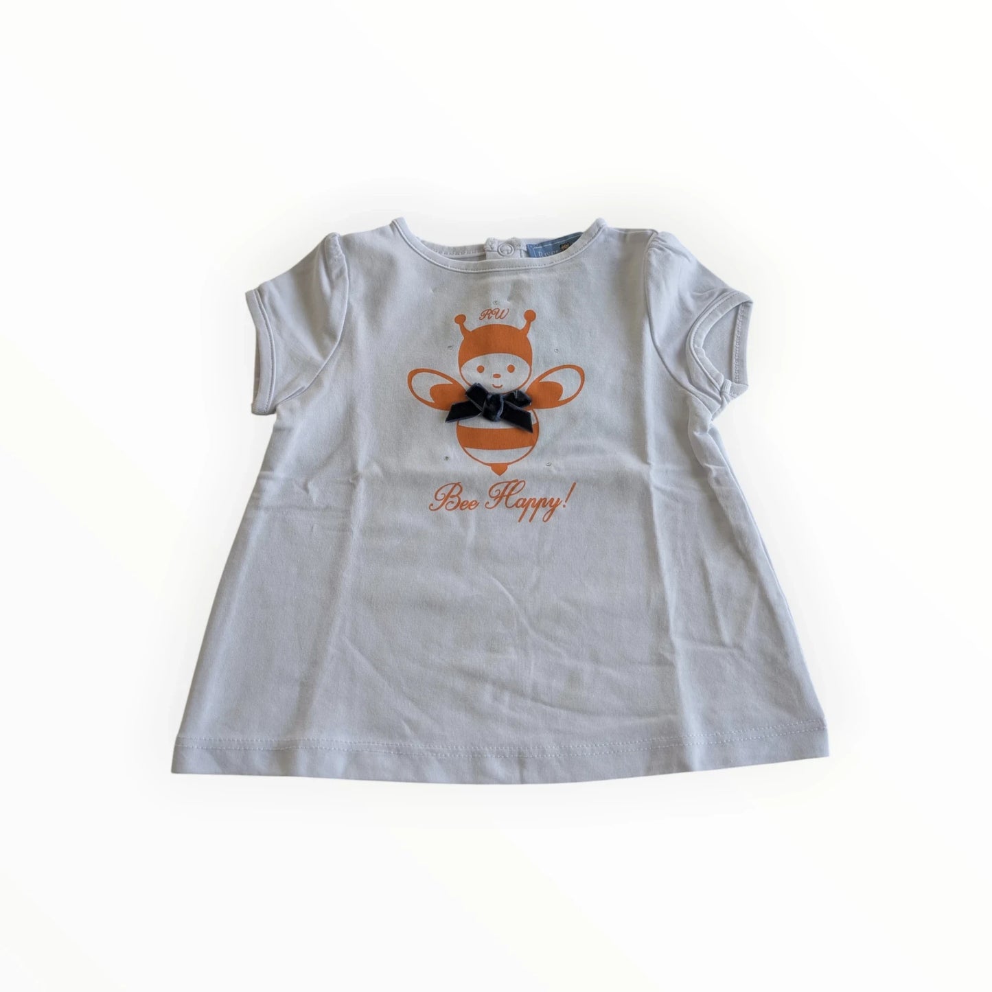 Pierrot Outlet baby meisje t-shirt jurk met korte mouwen, bijenprint en 'Bee Happy!' tekst. Gemaakt van katoen.