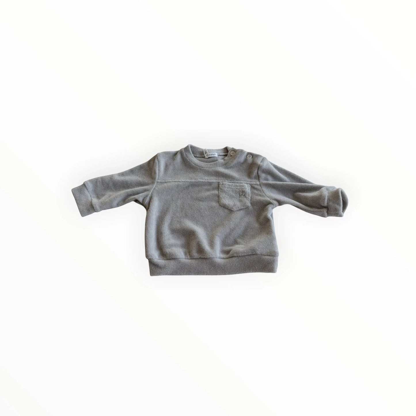 Pierrot Outlet baby meisjes trui met lange mouwen in zacht grijs fleece, met borstzak en drukknoopsluiting op de schouder.