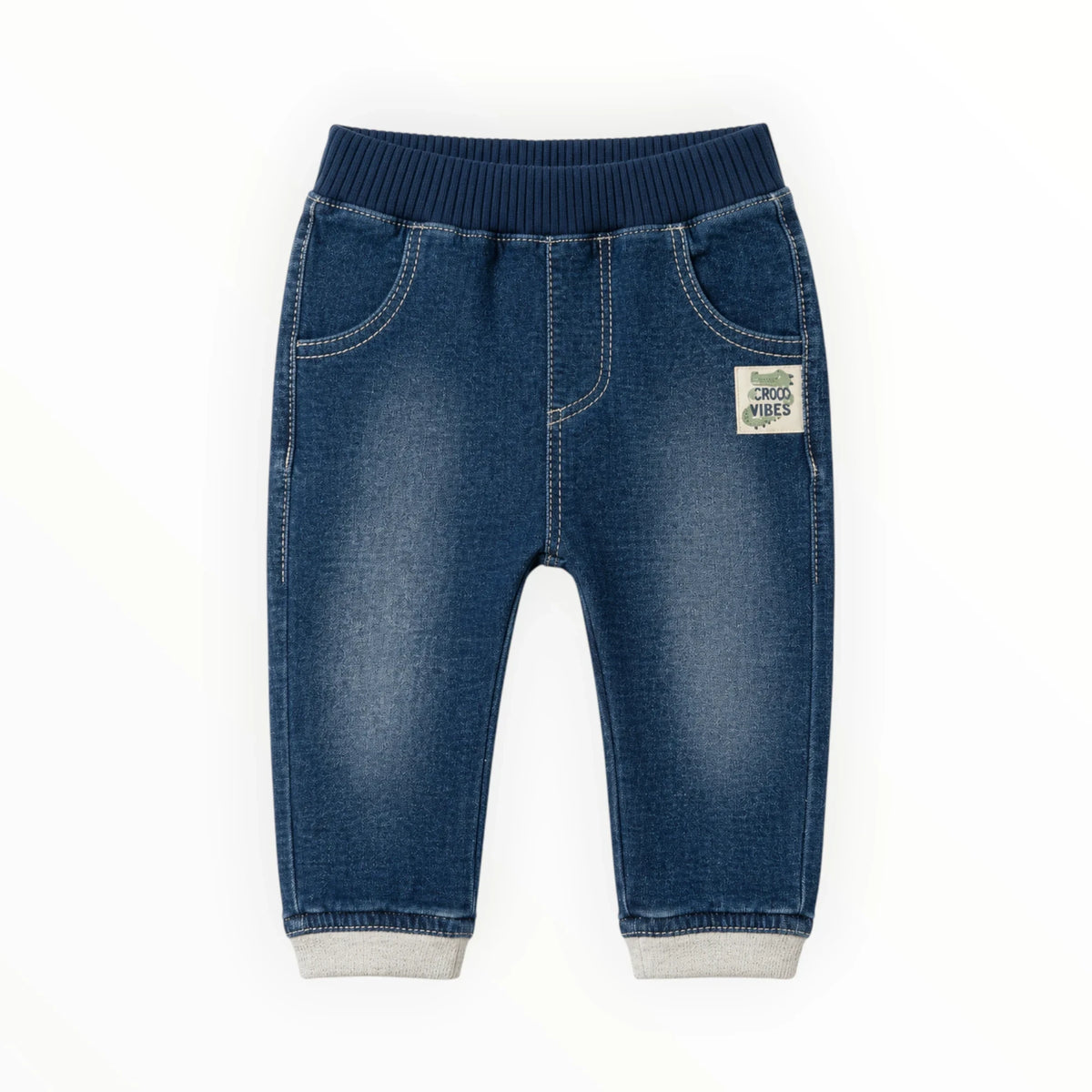 Pierrot Outlet babyjeans in diepblauw denim met elastische tailleband, boorden en Croco Vibes embleem op de voorzijde.