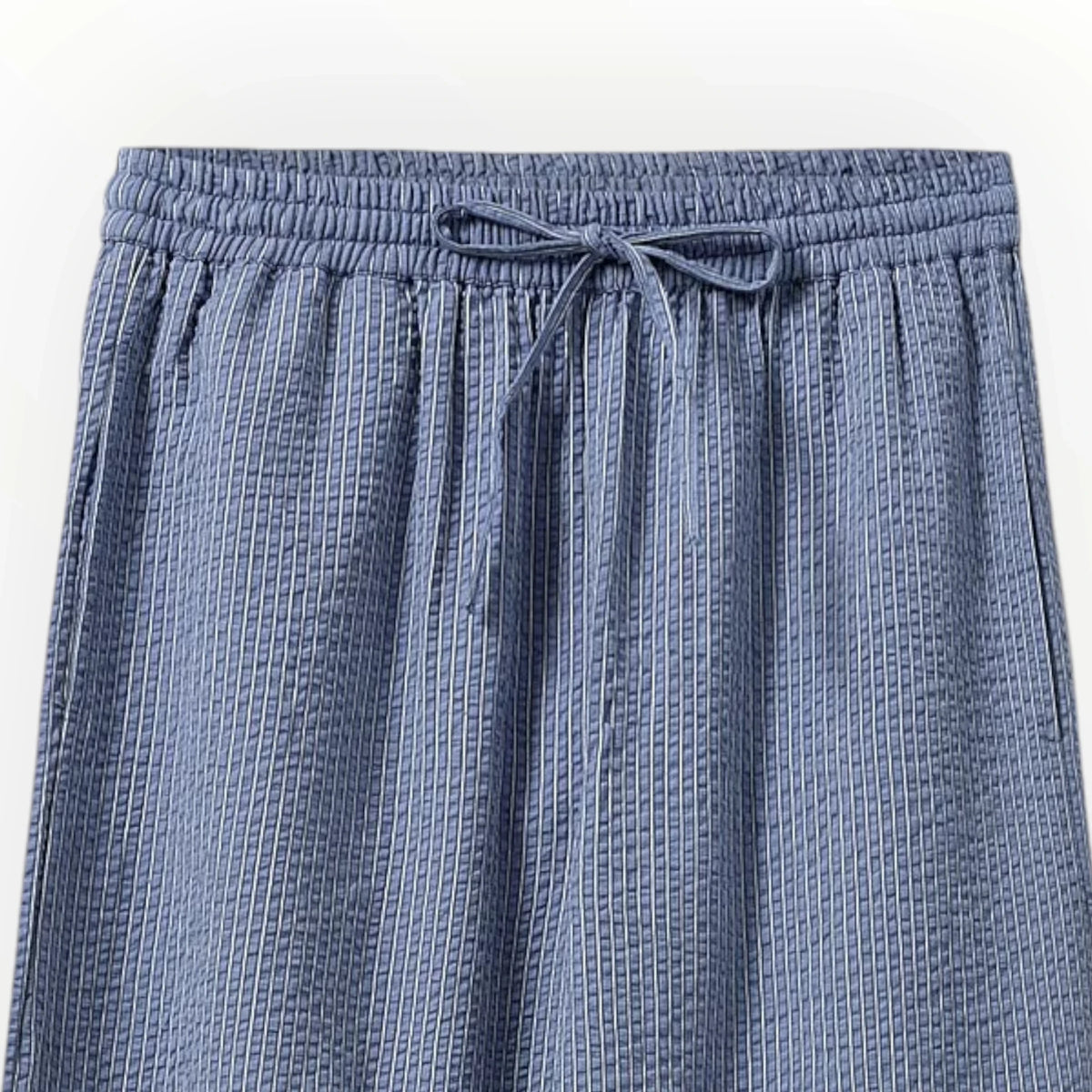 Pierrot Outlet blauwe loungebroek met elastische tailleband, trekkoord en subtiele textuur voor optimaal comfort.