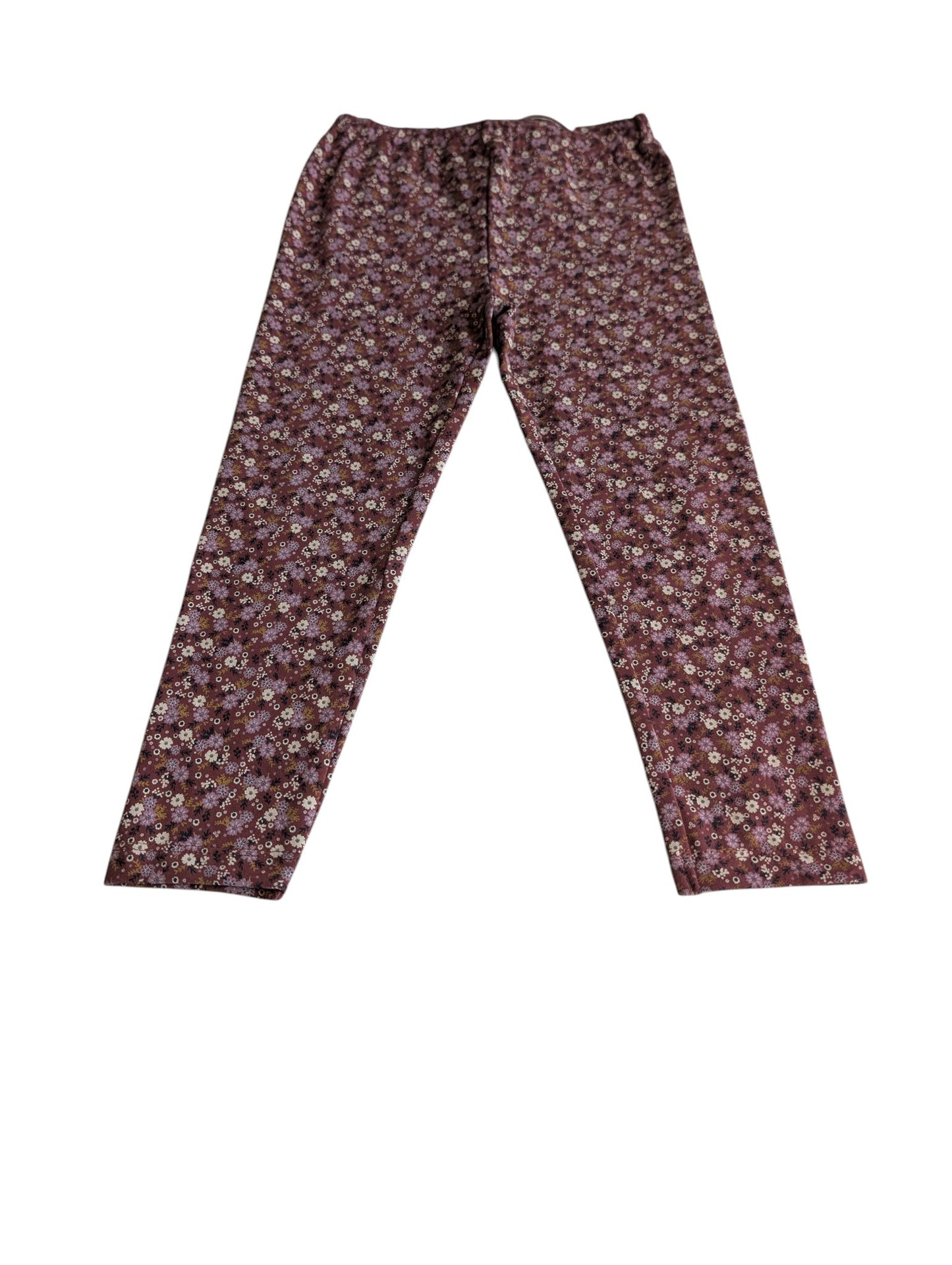 Pierrot Outlet dames legging met bloemenprint in aardetinten, paars en wit. Gemaakt van rekbare stof.