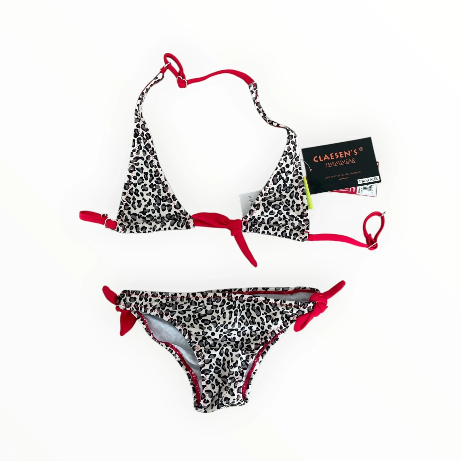 Pierrot Outlet Claesen's bikini met luipaardprint en felrode strikdetails, gemaakt van polyester en spandex.