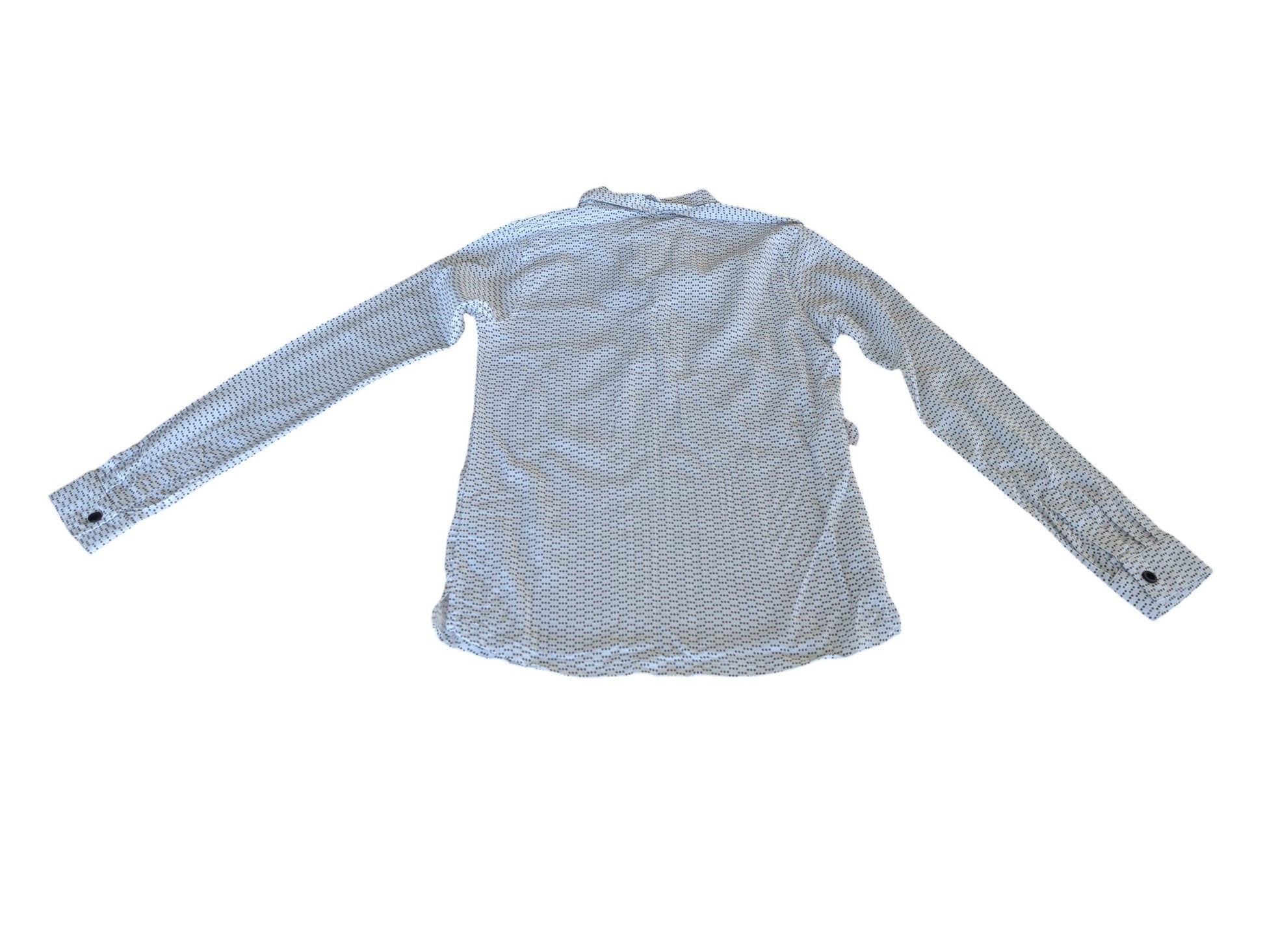 Pierrot Outlet dames blouse met lange mouwen, witte stof met subtiel zwart stippenpatroon en strikdetail.