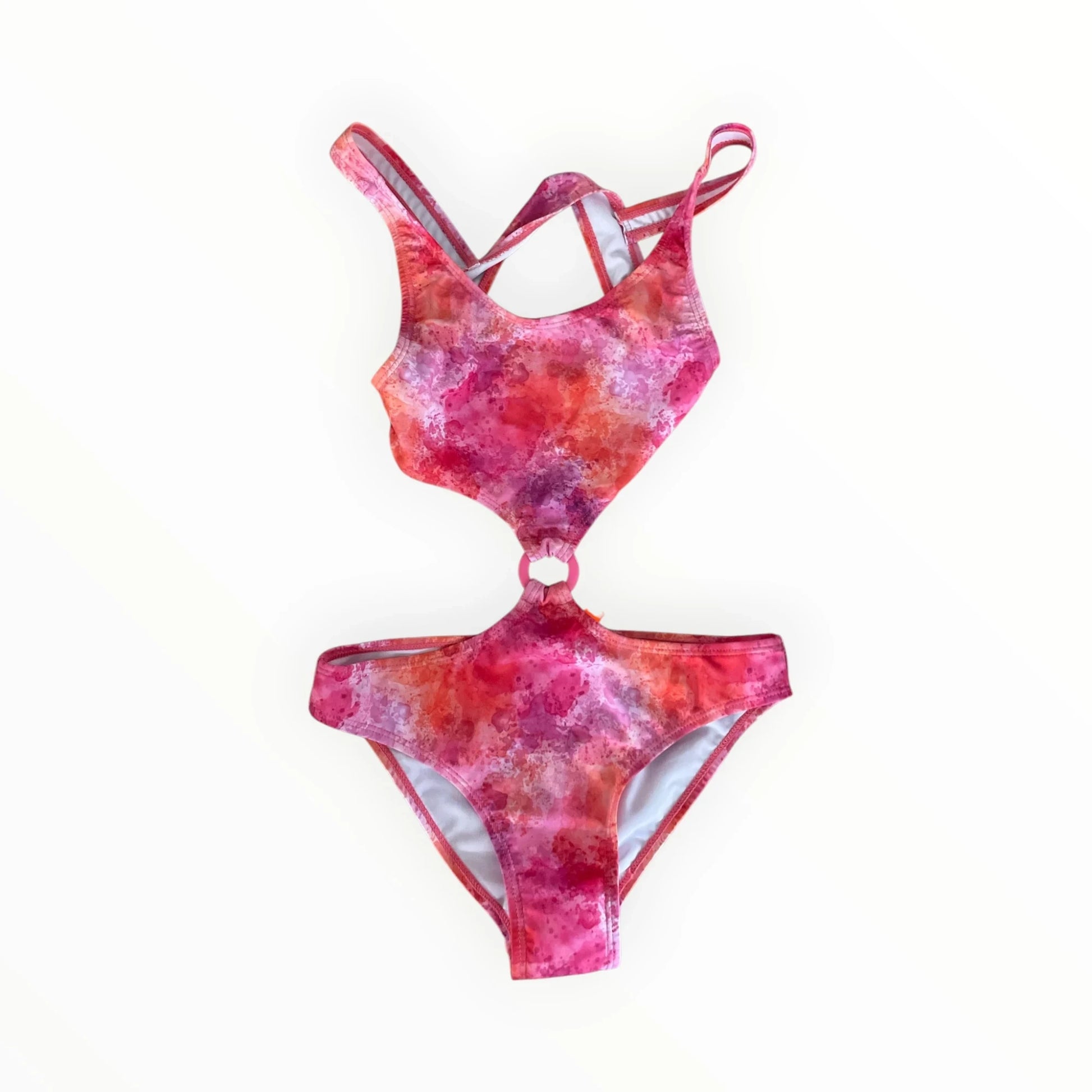 Pierrot Outlet dames monokini met roze en oranje aquarelprint, cut-out ontwerp en centrale ring voor een zomerse look.