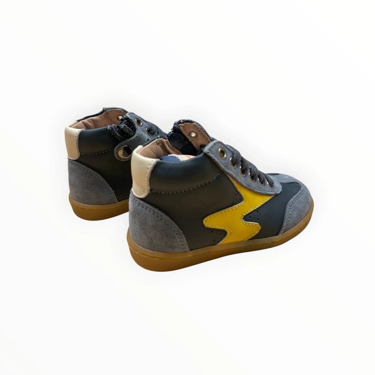 Pierrot Outlet kindersneakers in donkerblauw leer en suède met een opvallend geel bliksemschicht-detail en rubberen zool