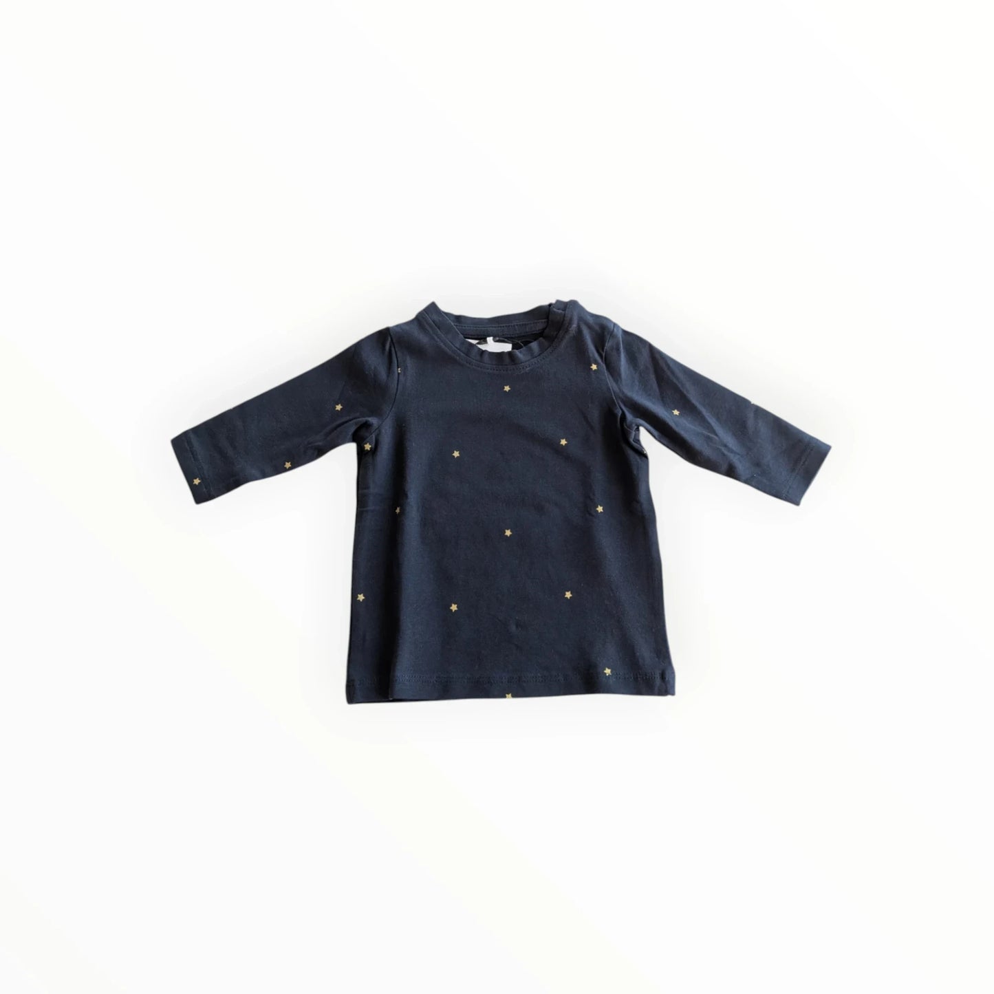 Pierrot Outlet donkerblauwe longsleeve voor baby's met gouden sterrenprint, gemaakt van katoen.