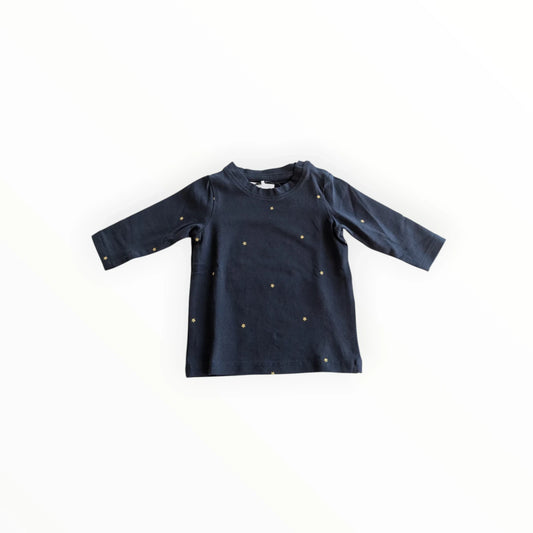Pierrot Outlet donkerblauwe longsleeve voor baby's met gouden sterrenprint, gemaakt van katoen.