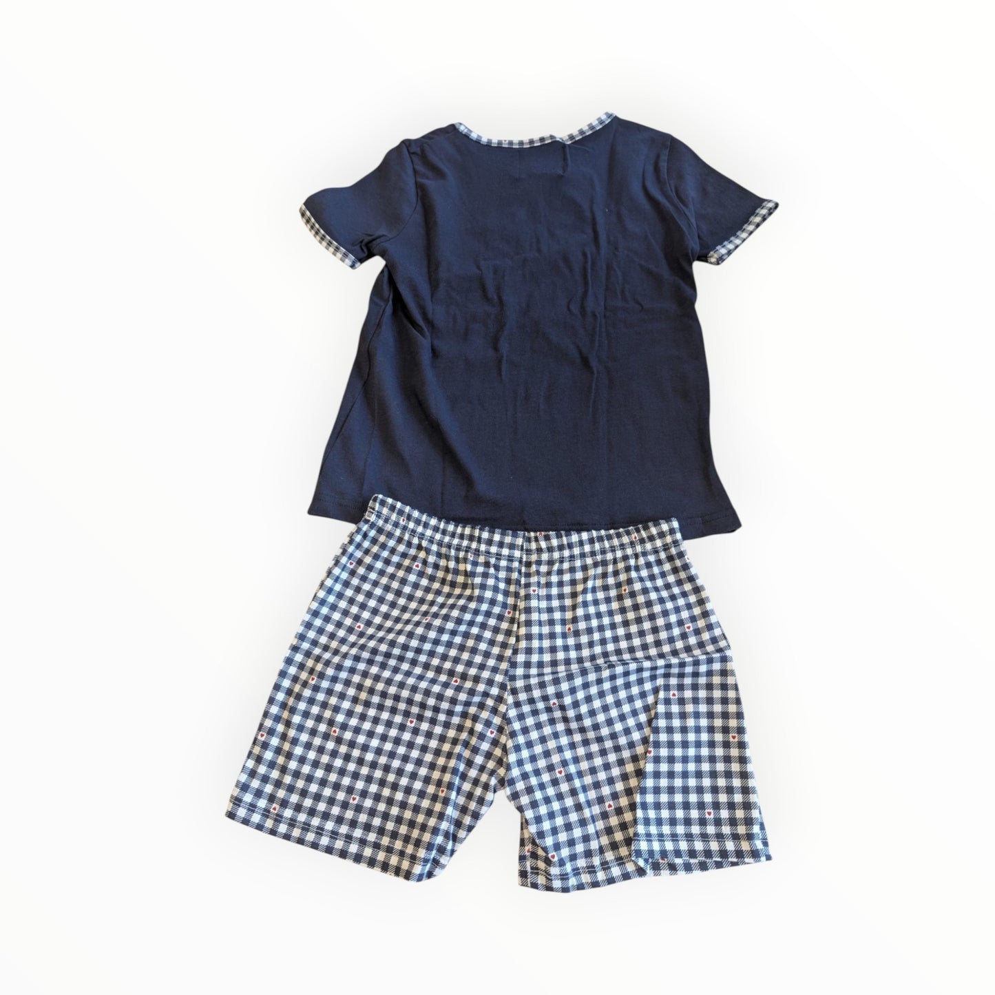 Pierrot Outlet pyjamaset met donkerblauw T-shirt en short met ruitjespatroon en hartjesdetails voor kinderen