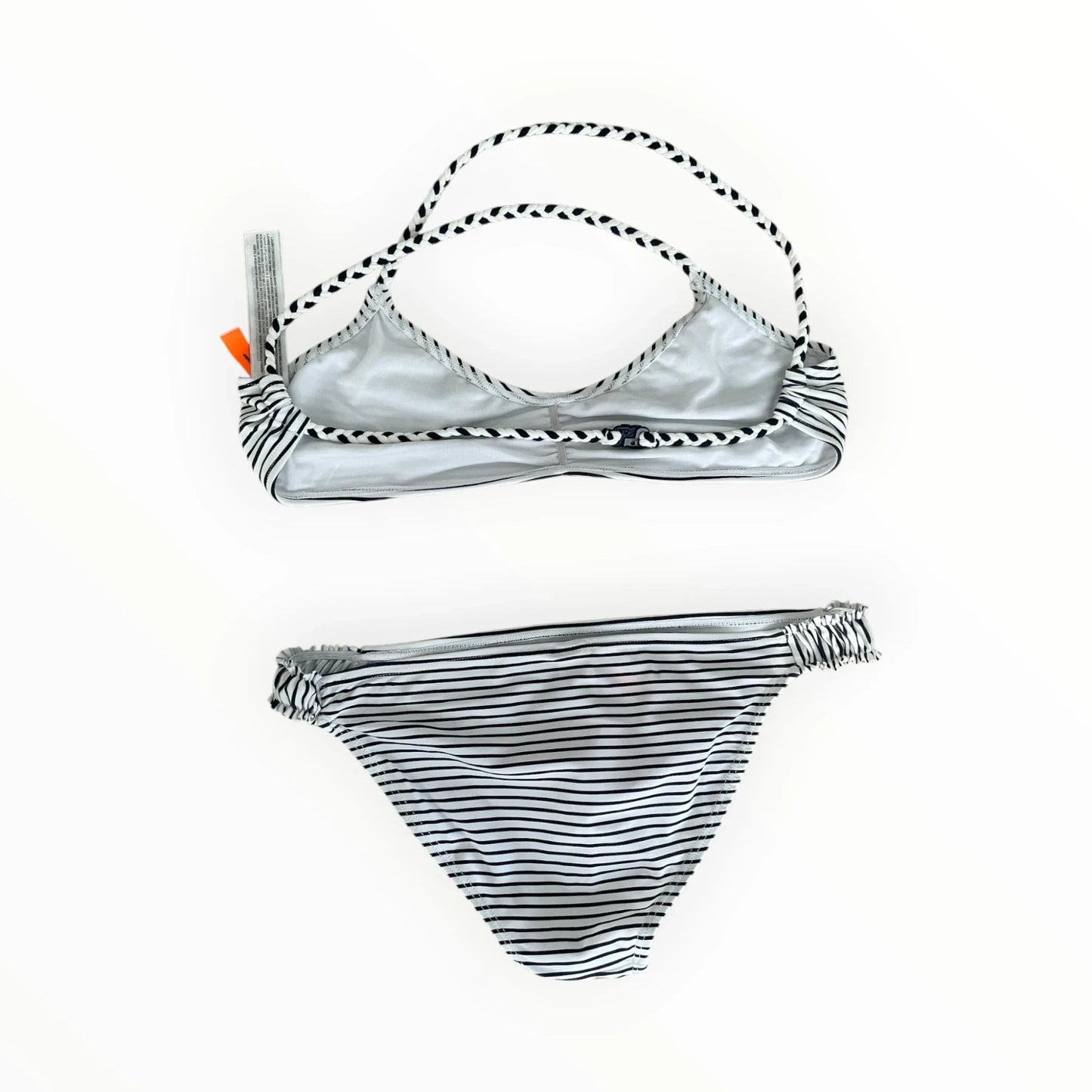 Pierrot Outlet tweedelige bikini met zwart-wit gestreept patroon, gevlochten bandjes en geplooid broekje.