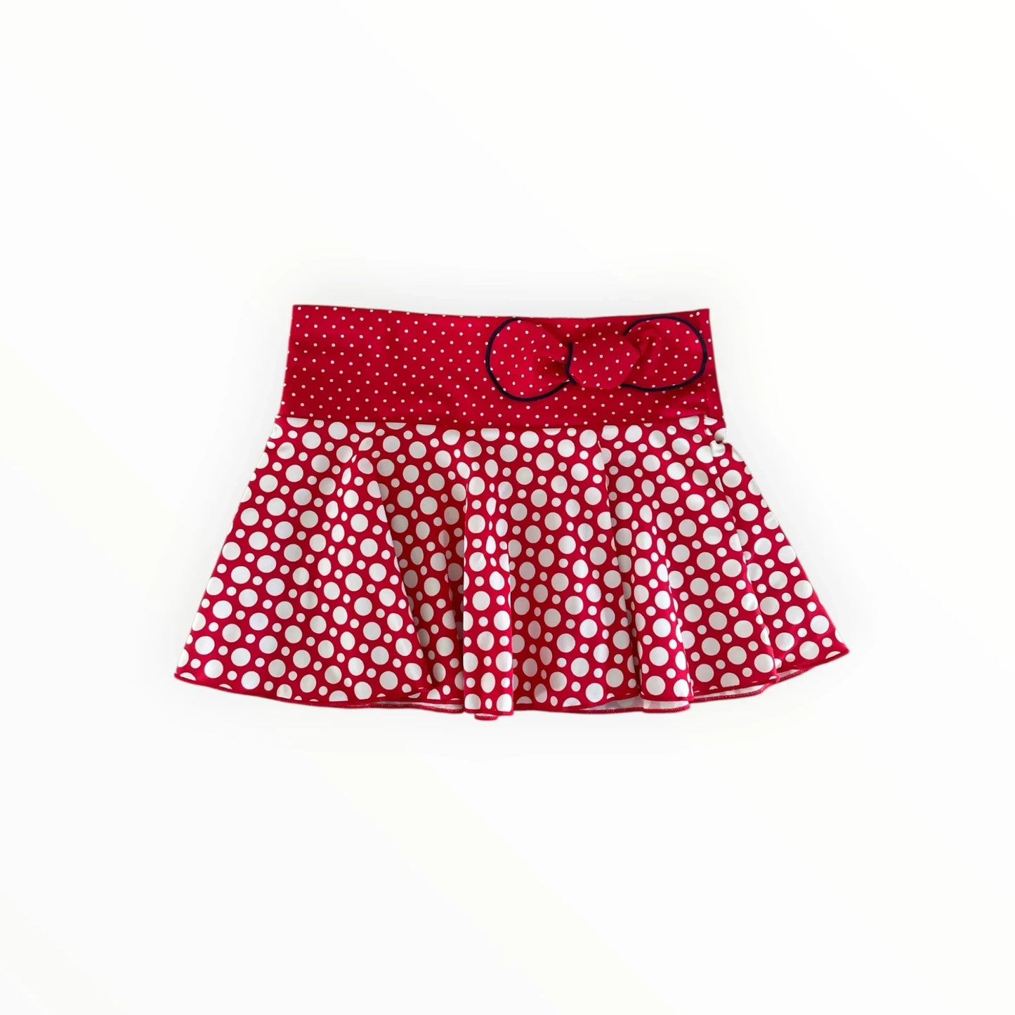 Pierrot Outlet kinderrokje in rood met witte stippen, voorzien van een comfortabele tailleband en een sierlijk strikje.