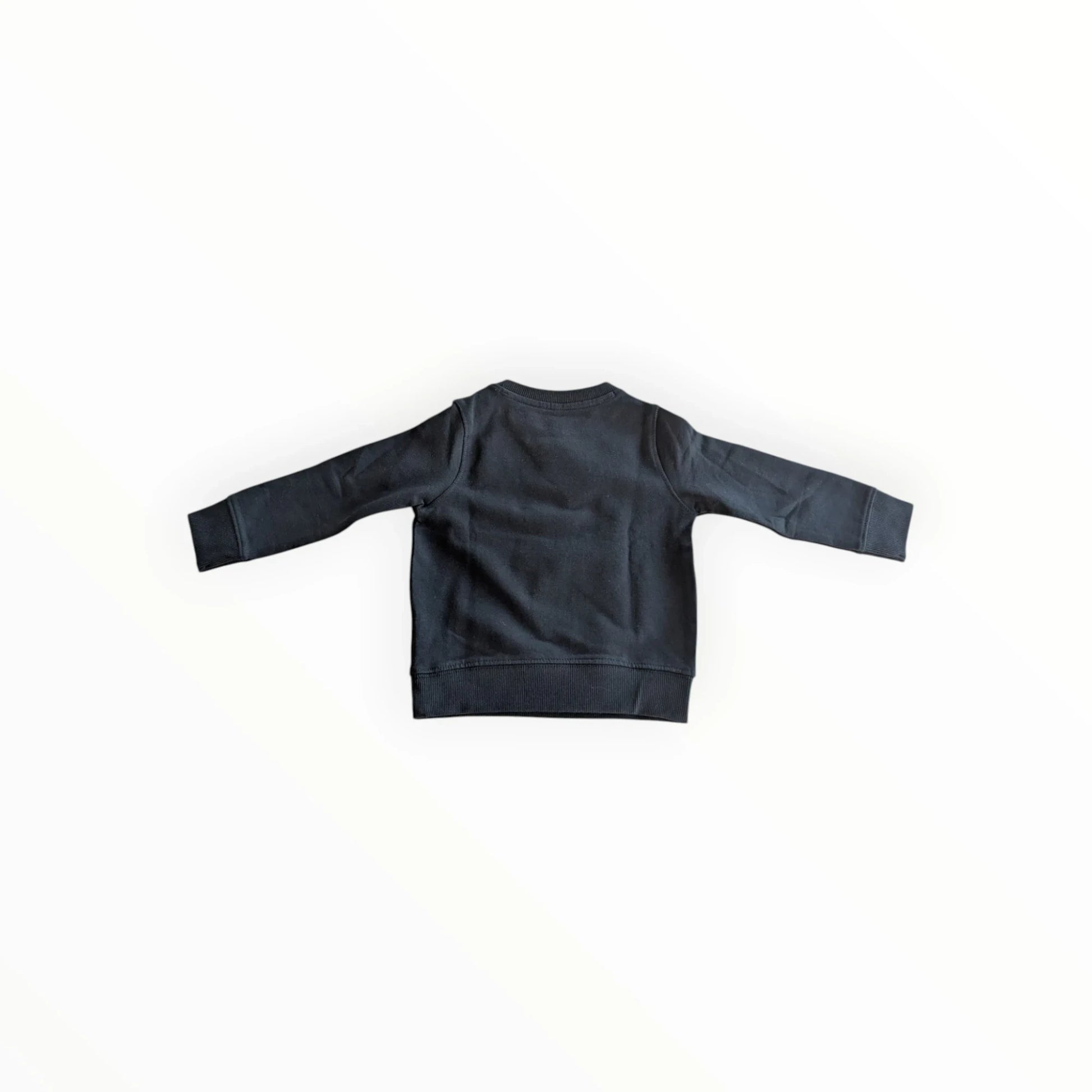 Pierrot Outlet jongens donkerblauwe sweater met bliksemprint en drukknoopjes op de schouder.