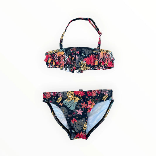 Pierrot Outlet bikini voor kinderen met jungle-print, ruches en verstelbare bandjes in kleurrijke tropische stijl.