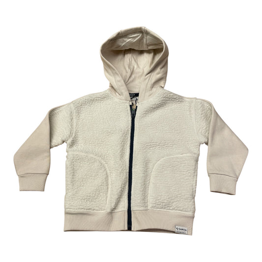 Pierrot Outlet beige teddy hoodie voor kinderen met rits, capuchon en steekzakken. Gemaakt van zachte teddy stof en katoen.