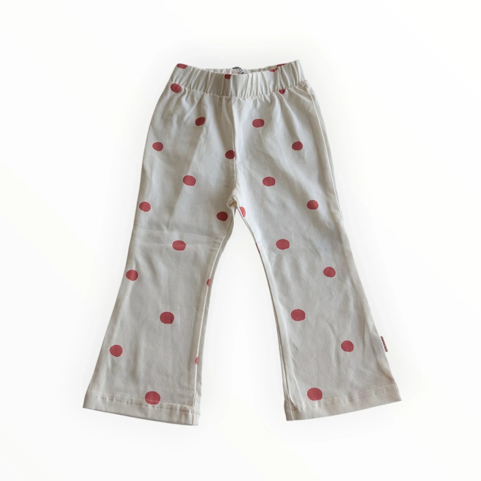 Pierrot Outlet off-white katoenen kinderbroek met rode stippen en wijde pijpen. Elastische tailleband.