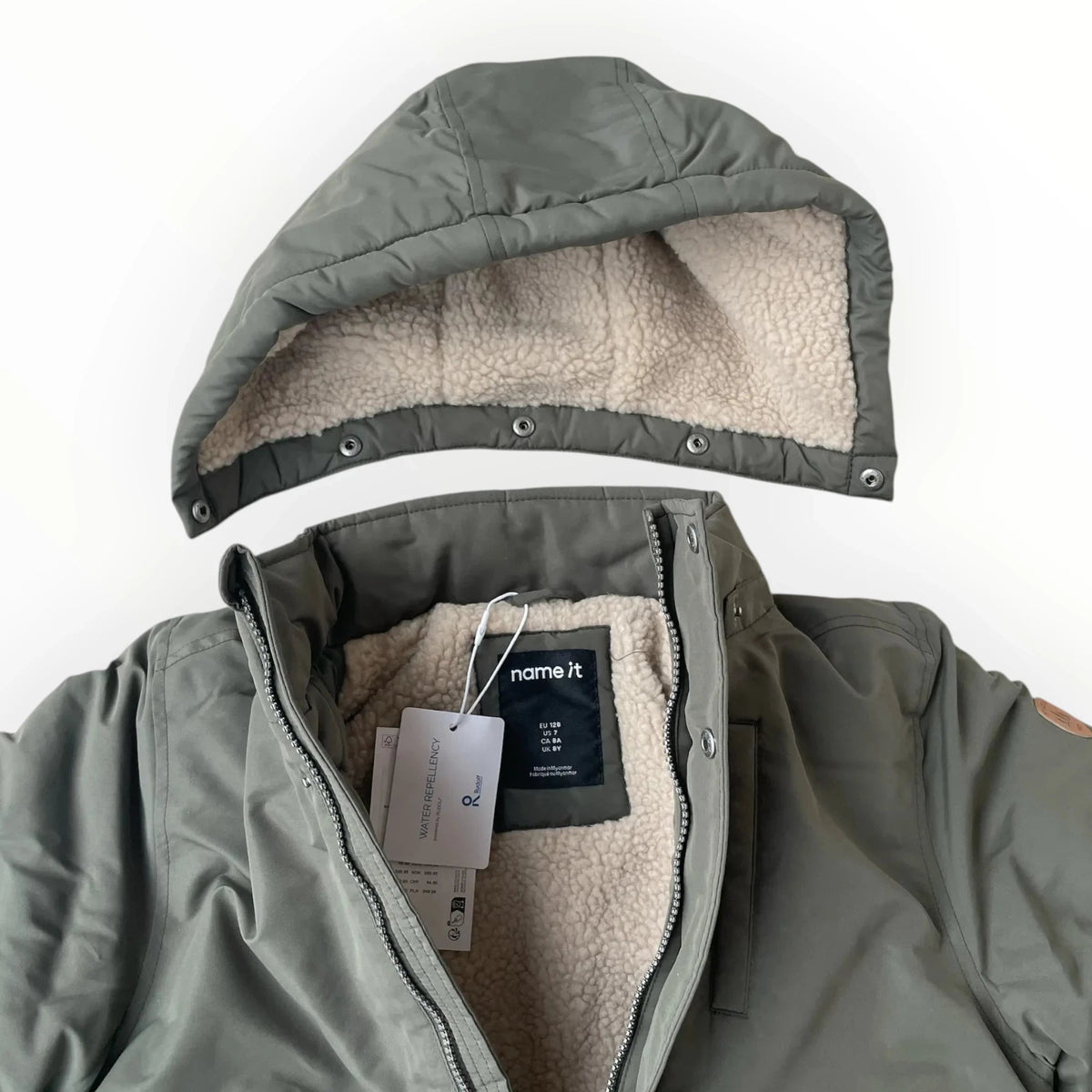 Pierrot Outlet olijfgroene Name It winterjas met teddyvoering en afneembare capuchon voor kinderen