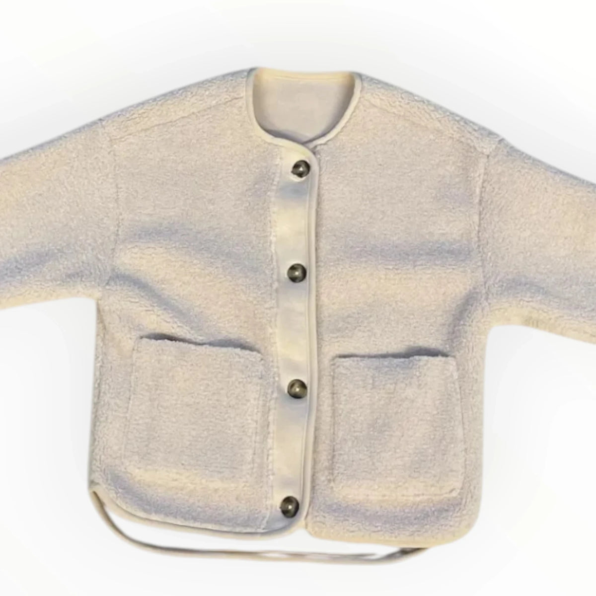Pierrot Outlet omkeerbaar teddy vest voor dames in off-white met ronde hals, knoopsluiting en twee voorzakken.