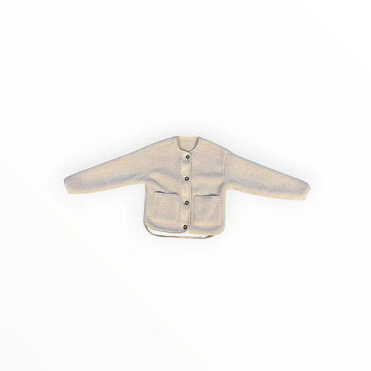 Pierrot Outlet omkeerbaar off-white teddy vest voor dames met ronde hals, knoopsluiting en twee voorzakken.