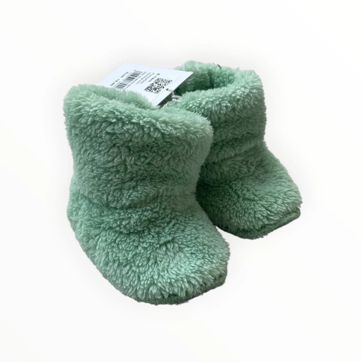 Pierrot Outlet mintgroene pluche babyslofjes met teddy-look, hoog model voor extra warmte en comfort.