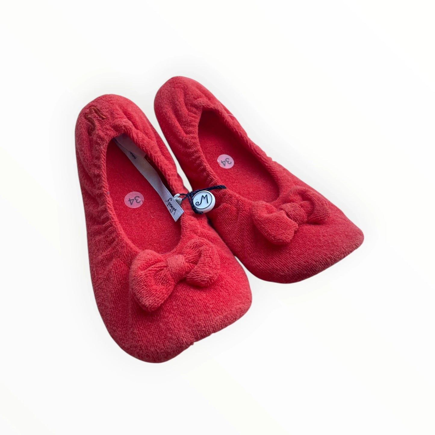 Pierrot Outlet dames pantoffels in zacht rood badstof met strikje en antislipzool.