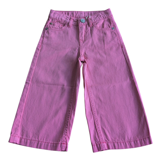 Pierrot Outlet roze culotte jeans voor kinderen met wijde pijpen en knoopsluiting. Gemaakt van stevig denim.