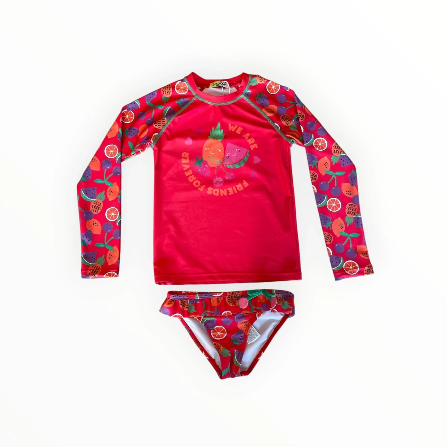 Pierrot Outlet tweedelige roze zwemset voor kinderen met fruitprint, lange mouwen en bikinibroekje met ruches.