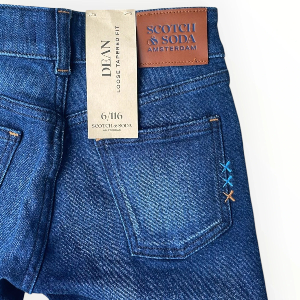 Pierrot Outlet Scotch & Soda Dean jeans in blauwe denim met leren merklabel en geborduurde details op de achterzak