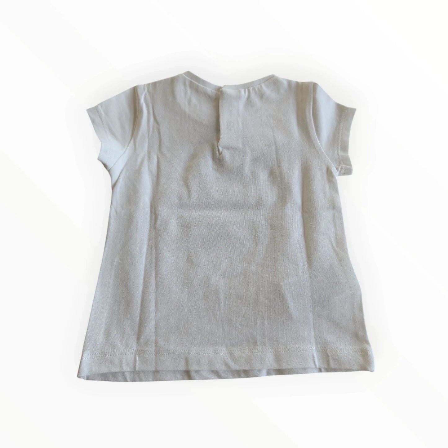 Pierrot Outlet wit katoenen T-shirt voor meisjes met bloemenapplicatie en knoopsluiting achter.