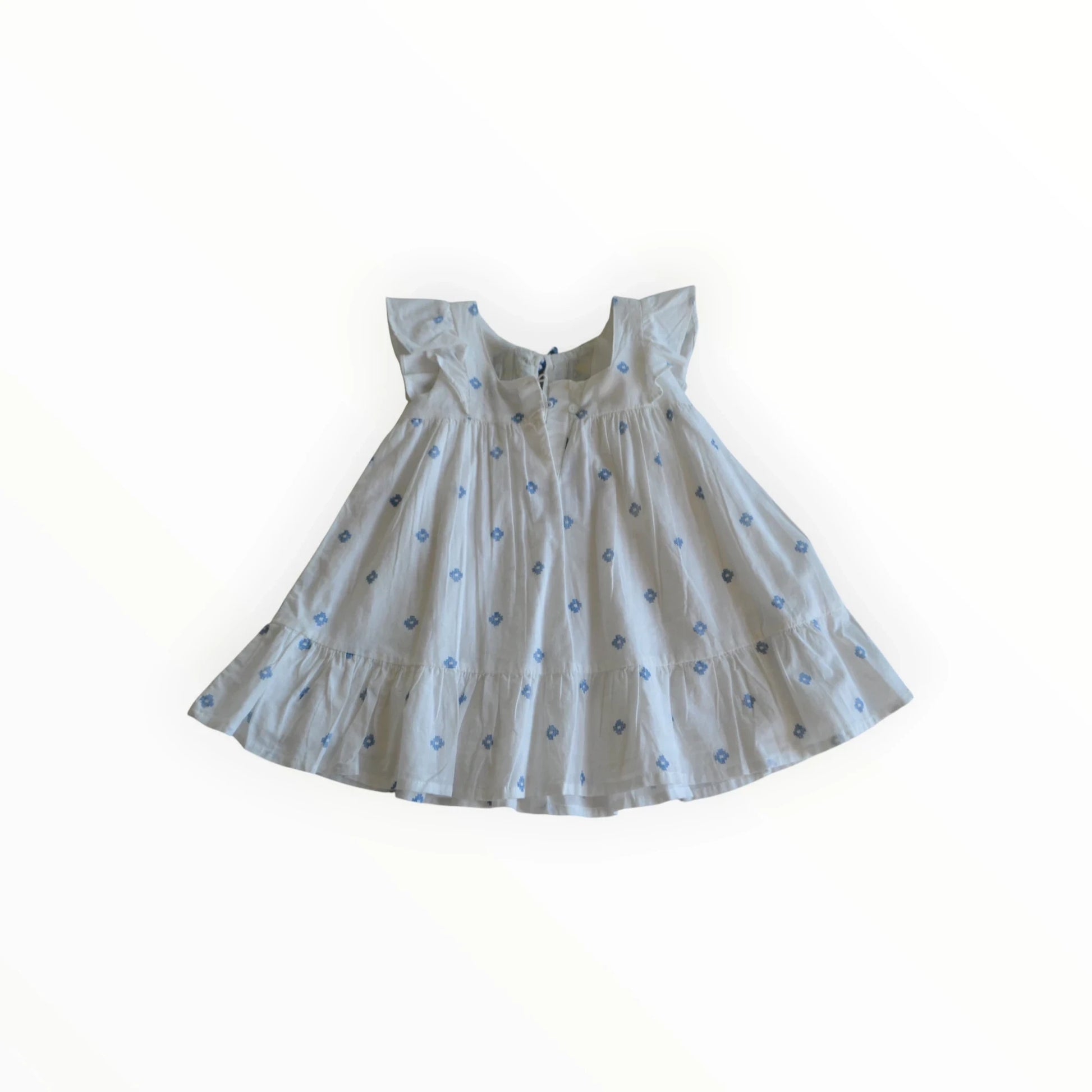 Pierrot Outlet zomerjurk van katoen met blauwe ruitprint, ruches en geborduurde details.