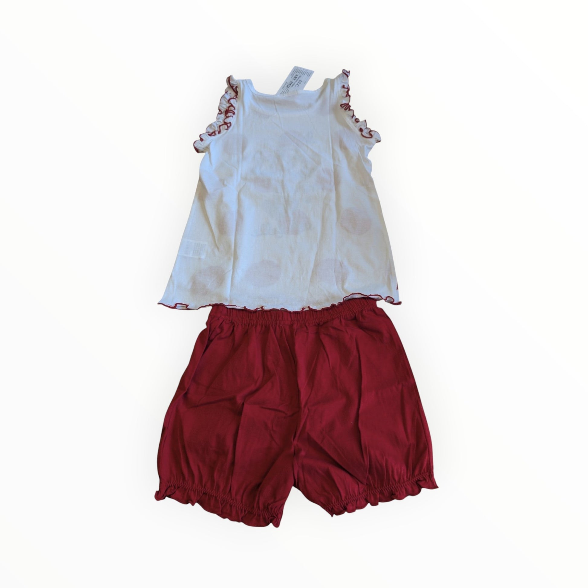 Pierrot Outlet zomerse kinderset met wit mouwloos shirt met stippen en rood broekje met pof-effect